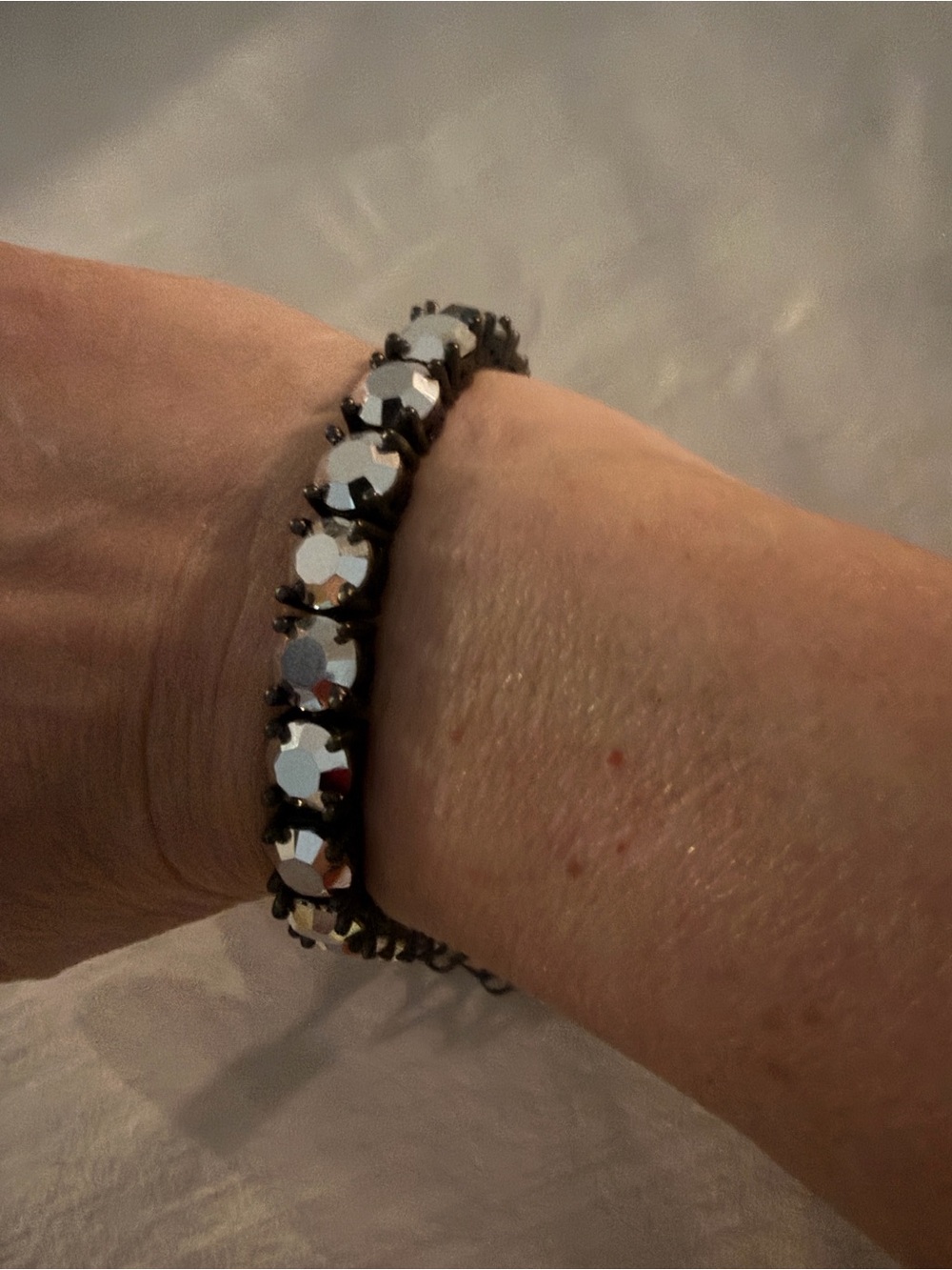 Park Lane Impressions Metallic Gold & Silver Bracelet. Set in Gunmetal.